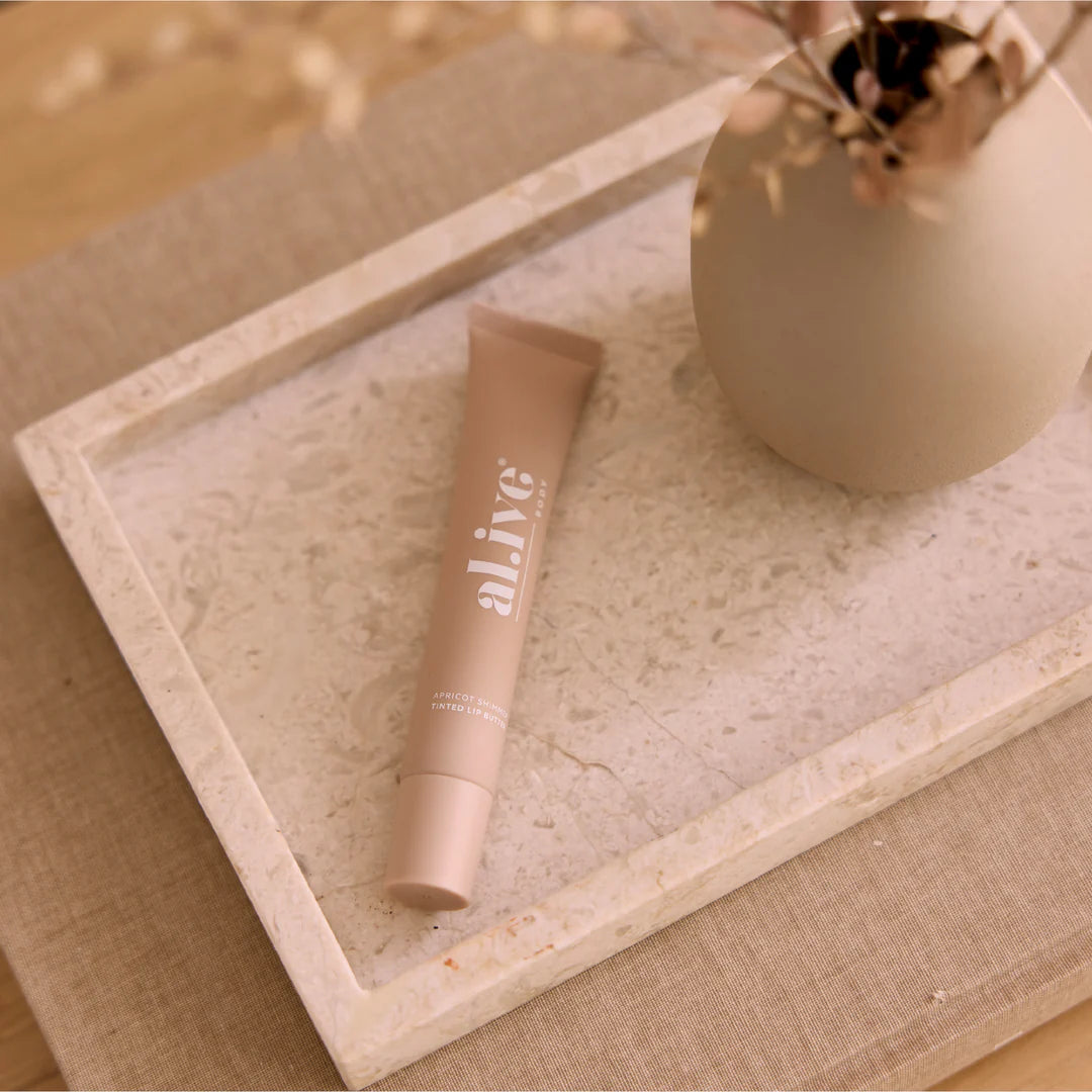ali.ve - tinted lip butter - apricot shimmer